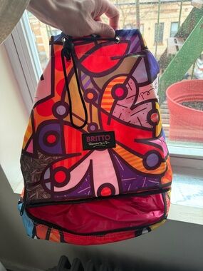 BRITTO Romero Bright Multicolor Drawstring Backpack with hidden lower storage